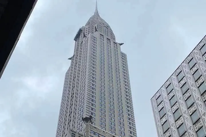 Chrysler Building tower seen from street level on a New York architecture tour of Art Deco midtown