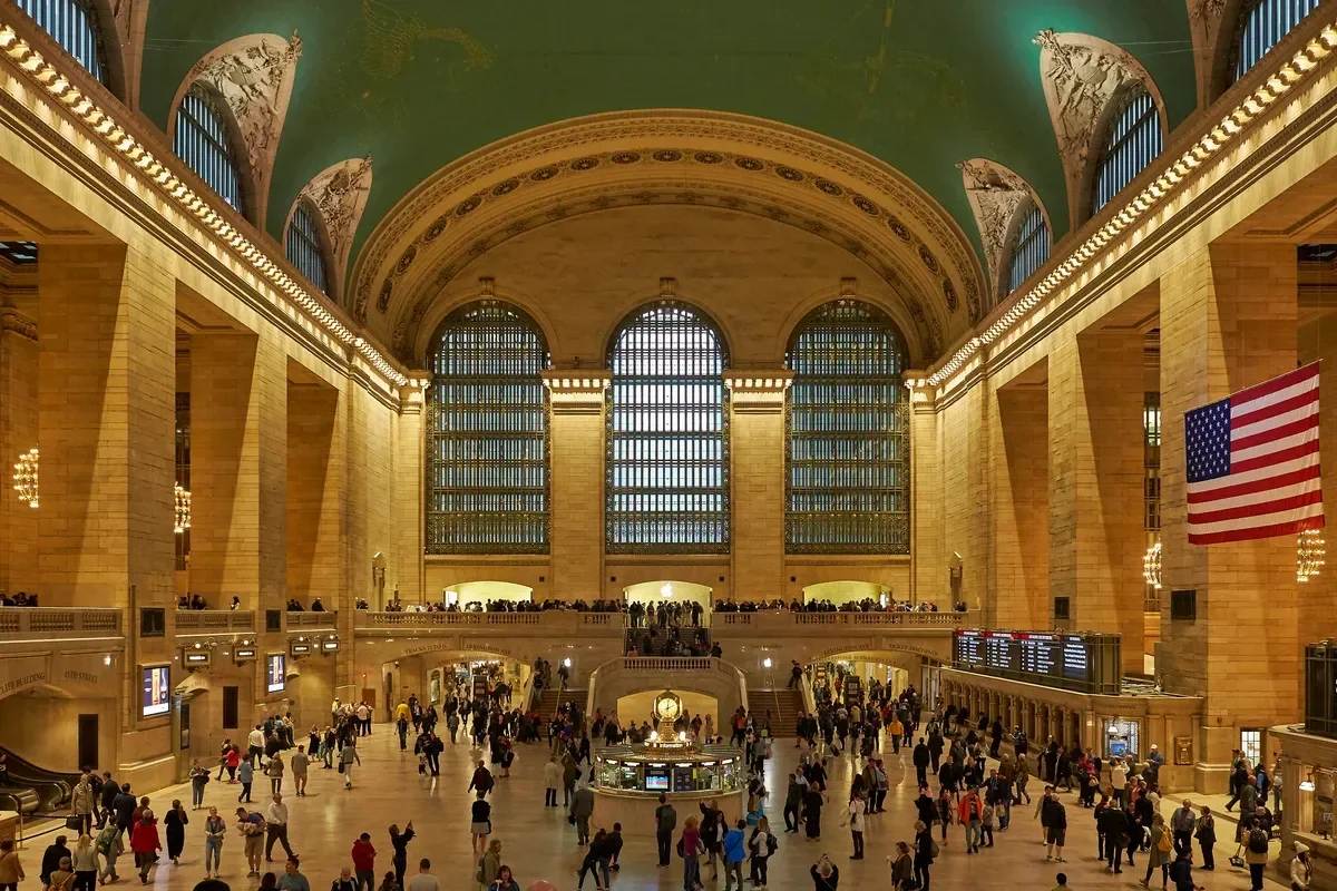 The Main Concourse of Grand Central Terminal with its arched windows and vaulted ceiling, a stop on a New York architecture tour