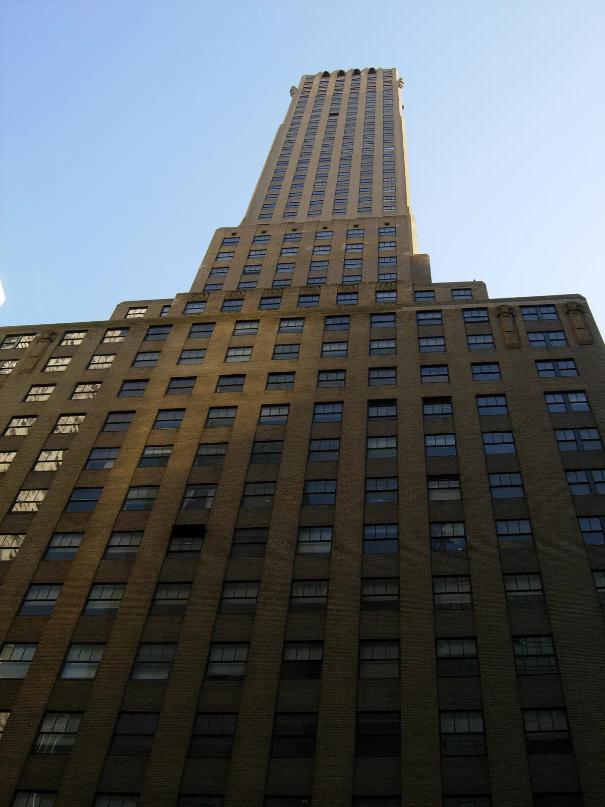 The stepped Art Deco tower of the Chanin Building on 42nd Street, seen from below, on a New York architecture tour
