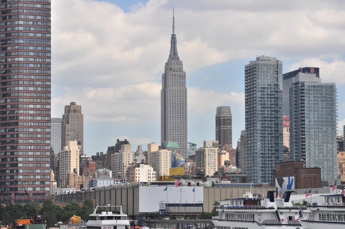 The Empire State Building and other Midtown towers seen from the Hudson River, on a New York architecture tour